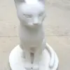 Modern sitting cat